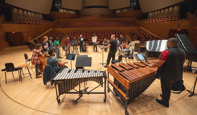 Students in MUSIC 159M rehearse with the music ensemble Wild Up for a performance of composer Julius Eastman’s work in Bing Concert Hall.